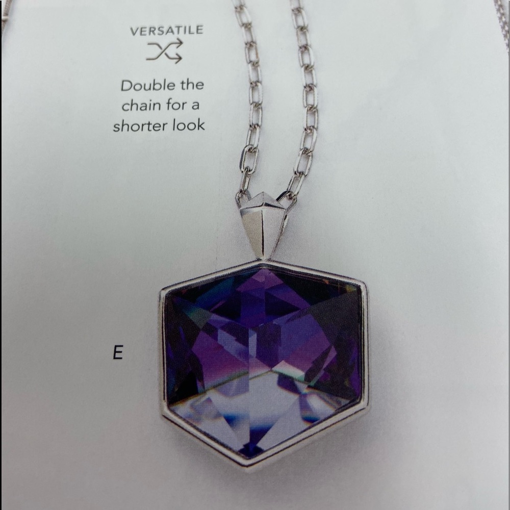 Touchstone Crystal stunning long purple pendant.